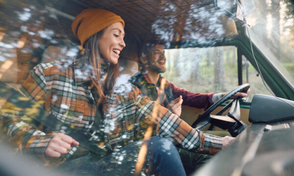 Two people driving
