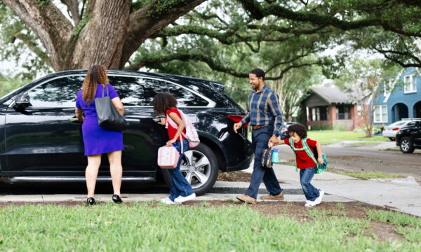 family getting ready to leave in their car