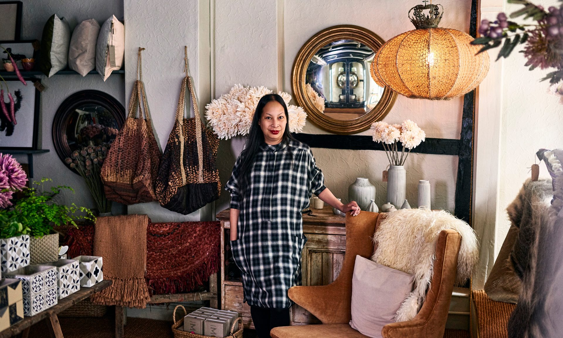 Portrait of female owner in boutique