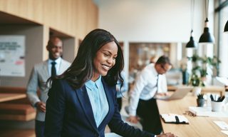 Employees in an office setting. Incentive stock options, or ISOs, are a form of compensation offered by some companies.