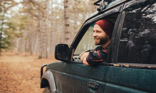 Man driving SUV