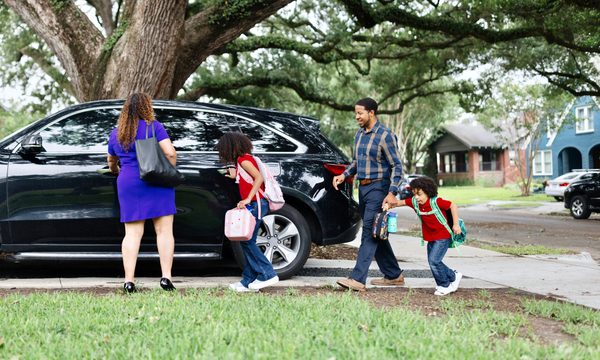 family getting ready to leave in their car