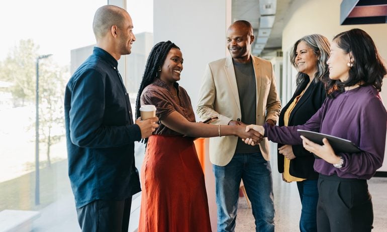 People shaking hands.